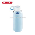 Botella de agua de vidrio con funda de silicona reutilizable